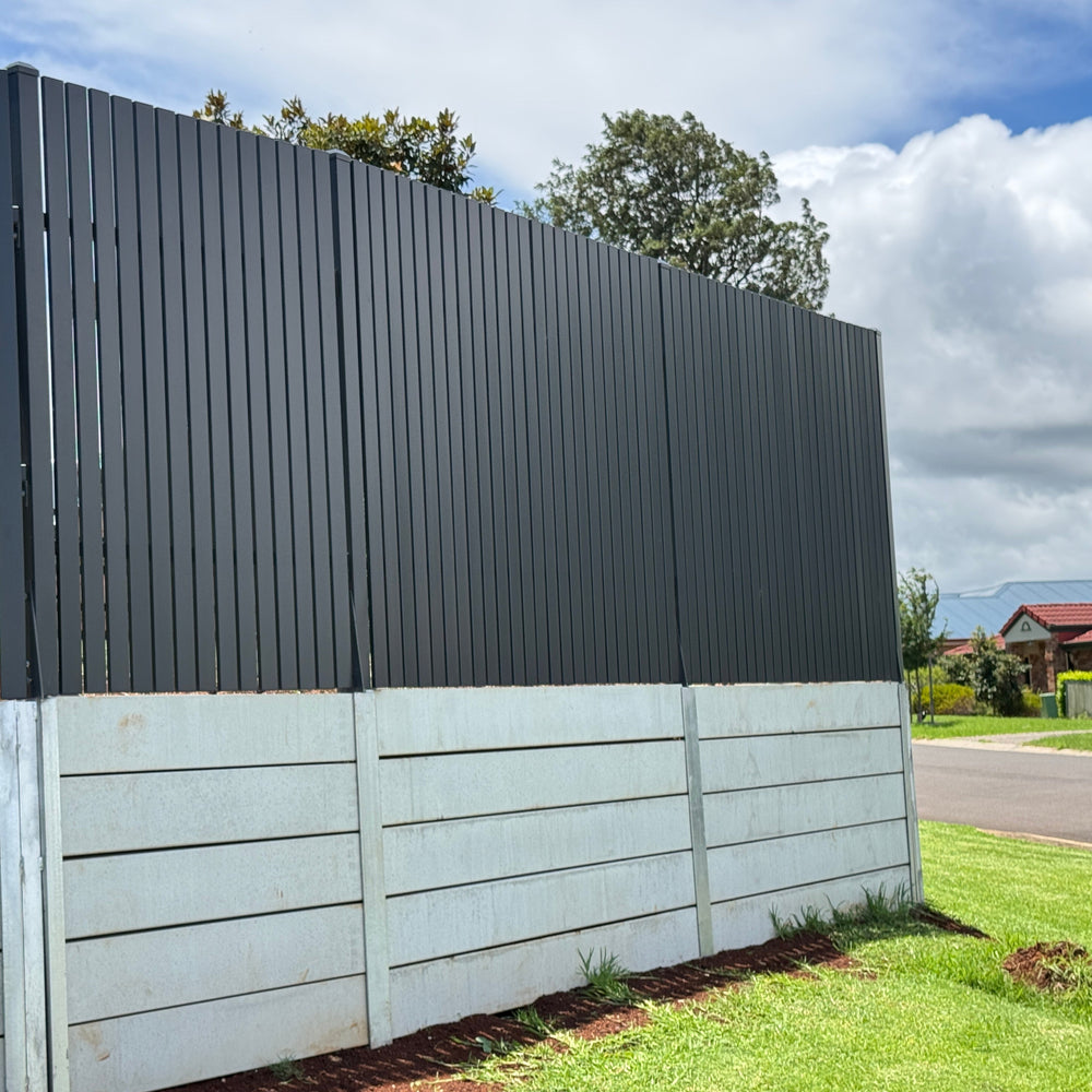 A black welded aluminium picket fence panel